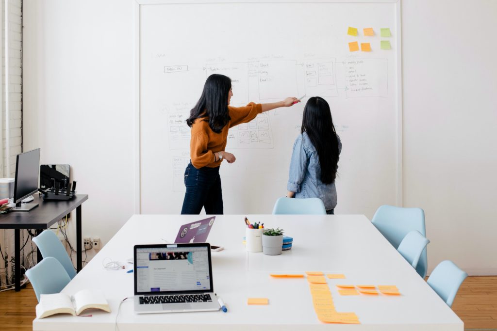 image of two women discussing