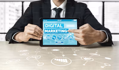 A man with an iPad displaying digital marketing